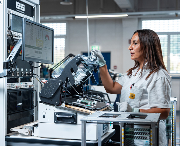 technician operating presser