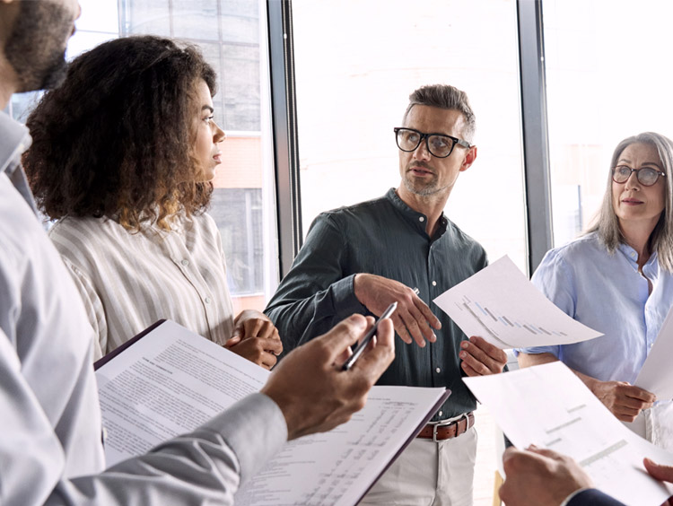 group of colleagues mid discussion